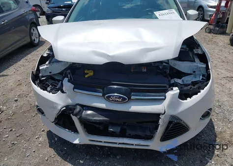 2014 Ford Focus Titanium from USA, damaged, VIN 1FADP3N27EL309324